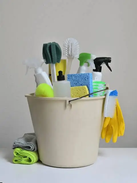 Missa Clean cleaner wiping a kitchen counter during an Airbnb turnover in Boulder, CO